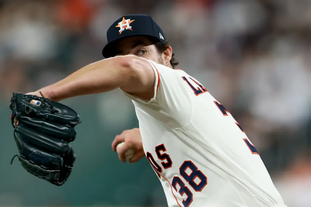 Houston Astros starting pitcher Peter Lambert throws to the plate...