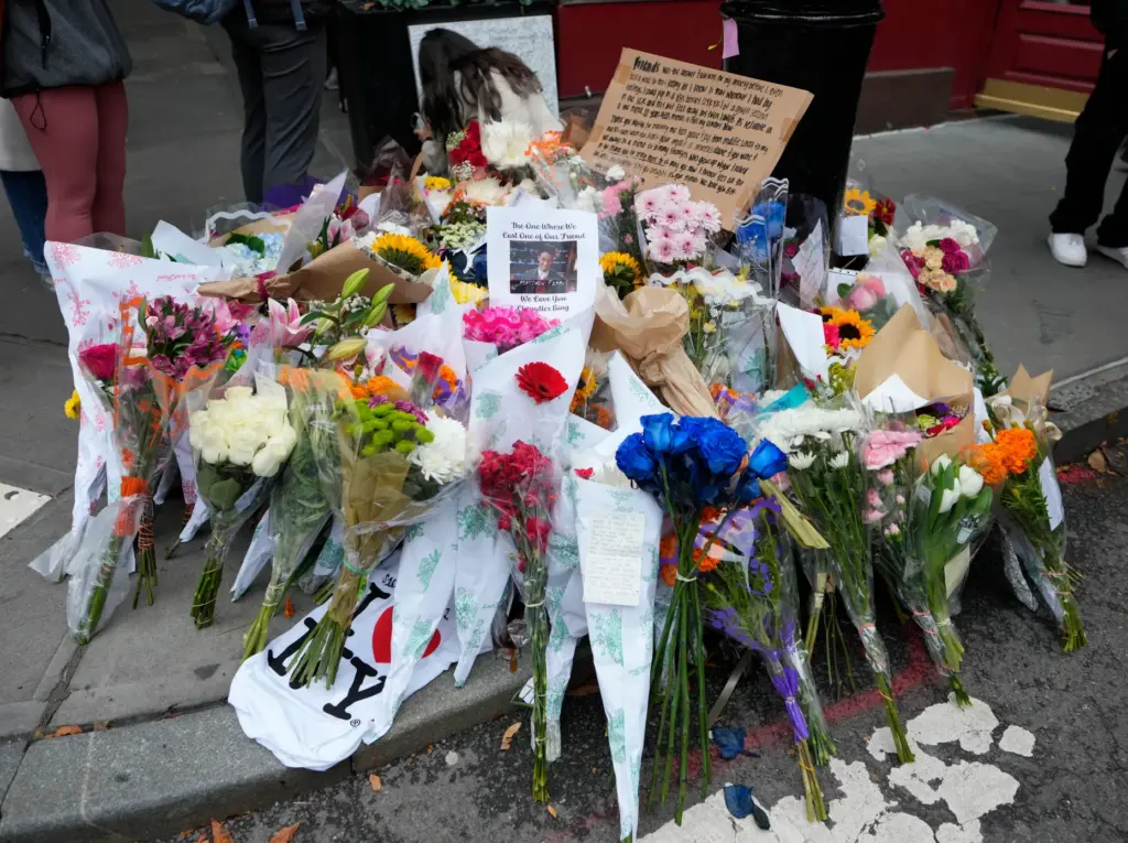 A makeshift memorial for Matthew Perry is seen outside the...