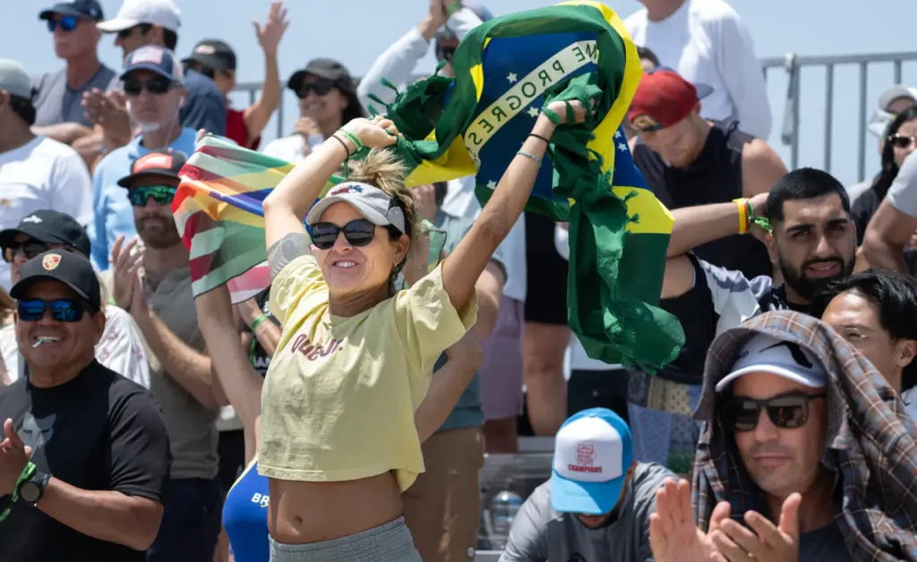 Brazilian fans wave flags during the AVP womenâs finals in...