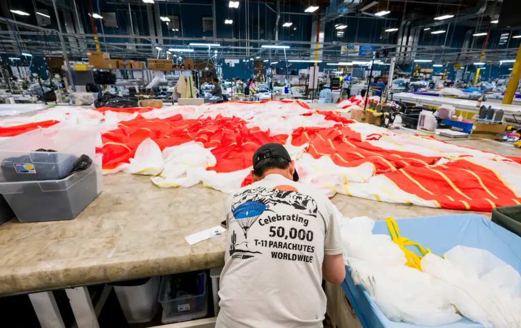 An employee works on one of the three canopies for...