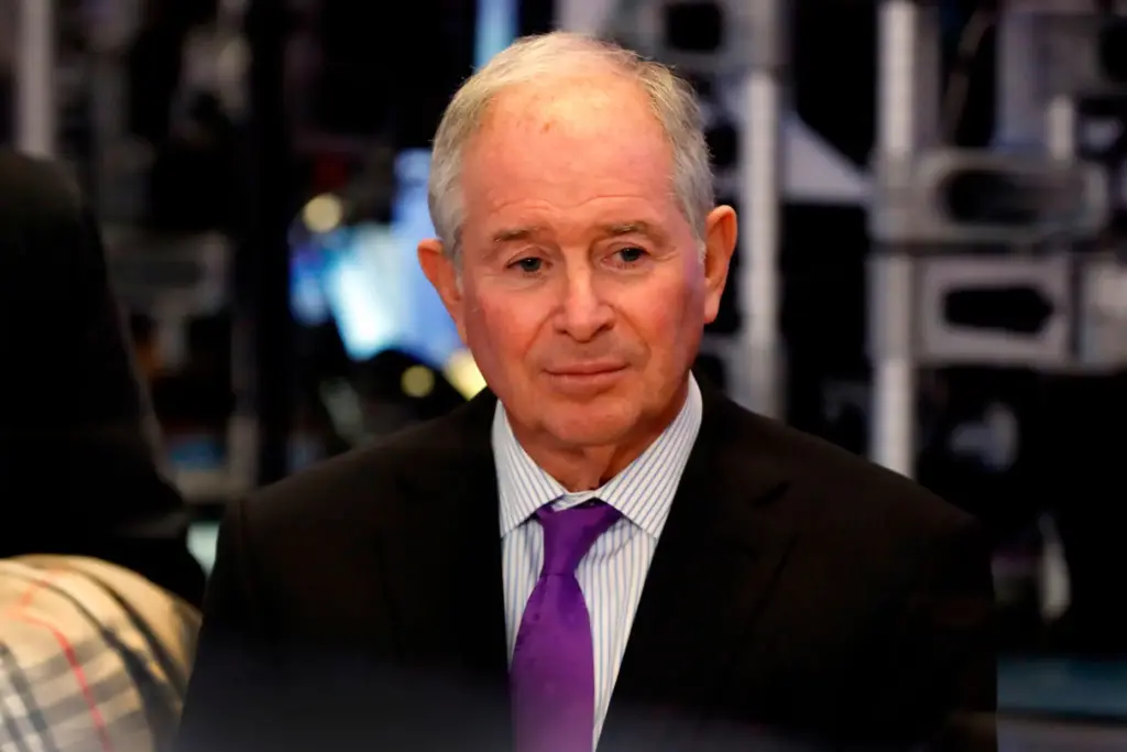 Stephen Schwarzman waits to be interviewed on the floor of the New York Stock Exchange.