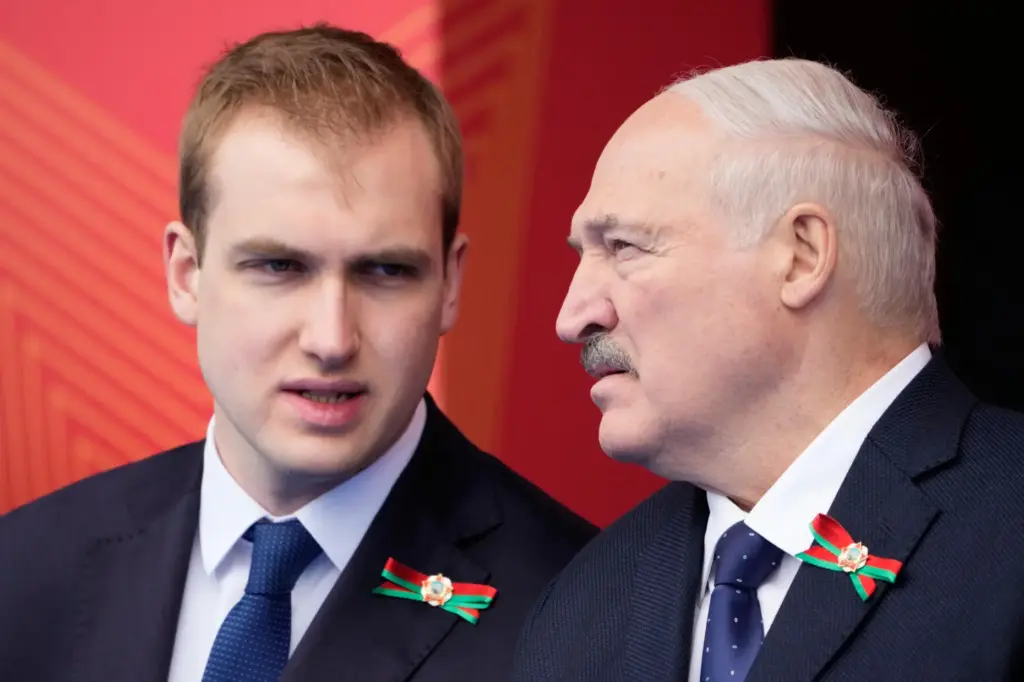 elarusian President Alexandr Lukashenko, right, speaks with his son Nikolai