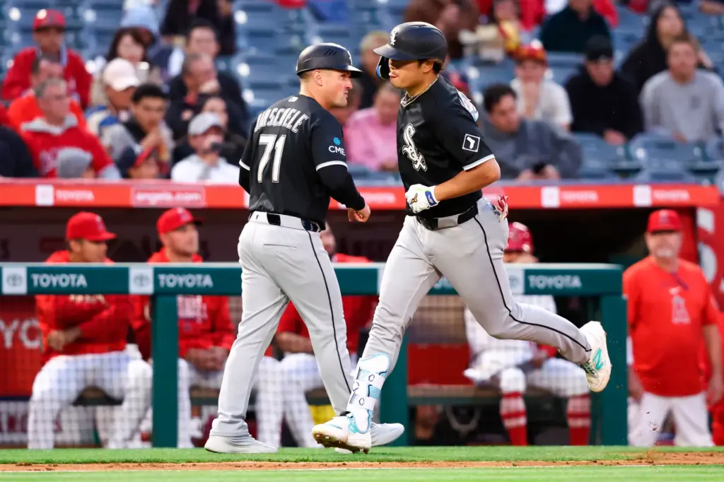 The Chicago White Sox’s Munetaka Murakami, right, celebrates with third...