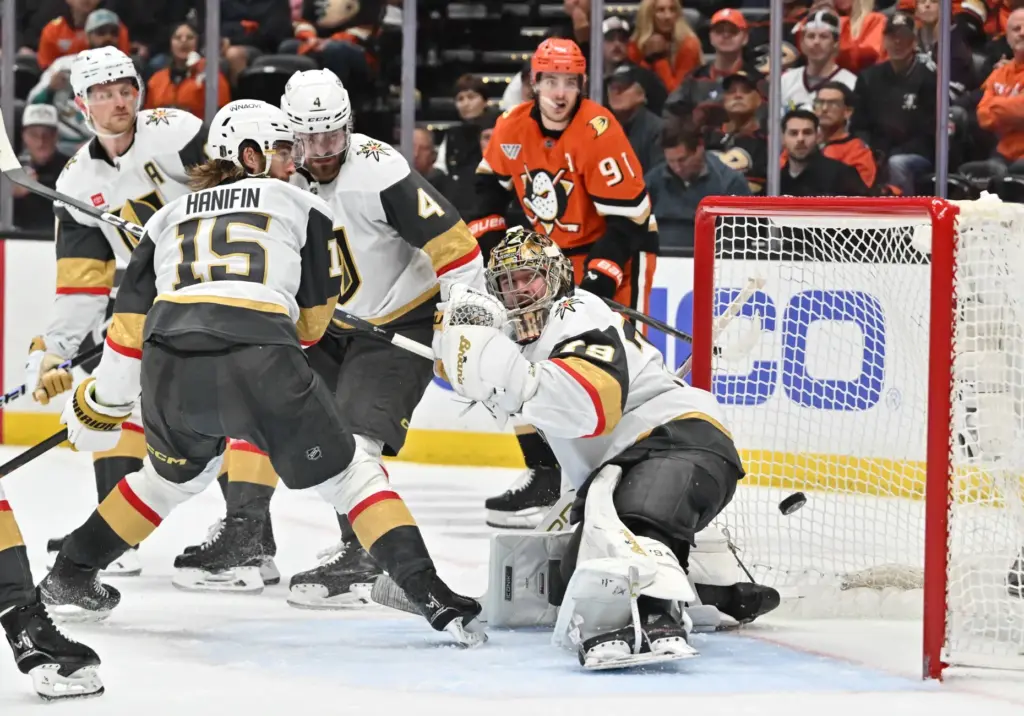 Vegas Golden Knights goaltender Carter Hart, right, can’t stop a...
