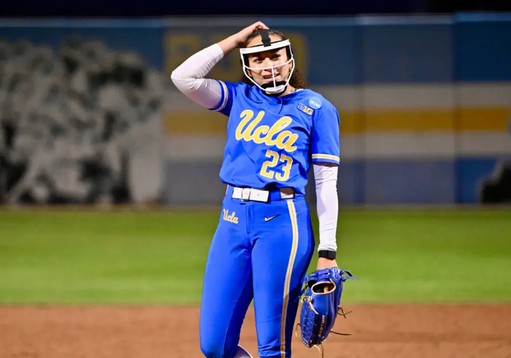 Starting pitcher Taylor Tinsley #23 of the UCLA Bruins reacts...