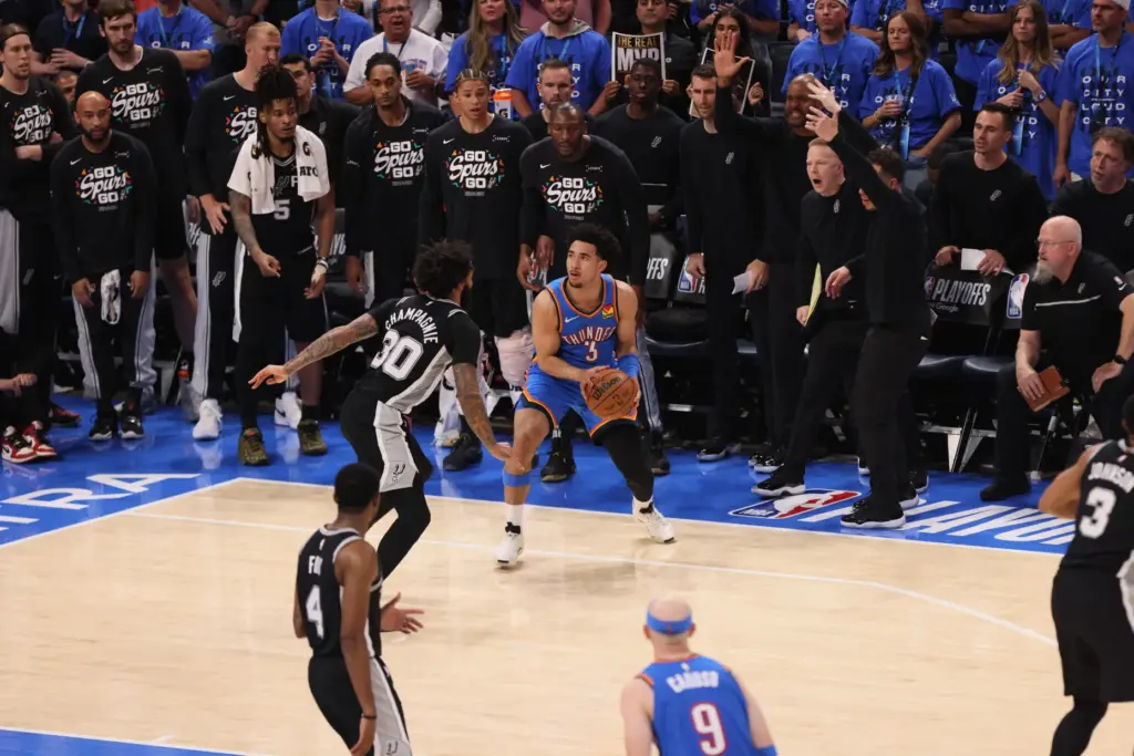 Oklahoma City Thunder guard Jared McCain (3) looks to shoot...