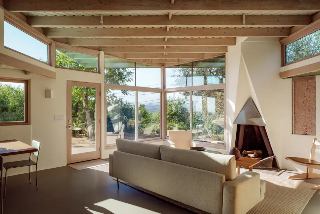 The stainless-steel fireplace in the living room. (Photo by David...