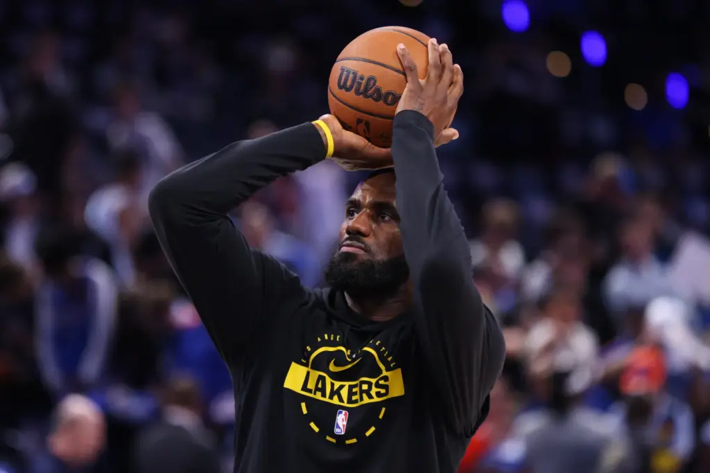 Lakers star LeBron James warms up before Game 2 of...