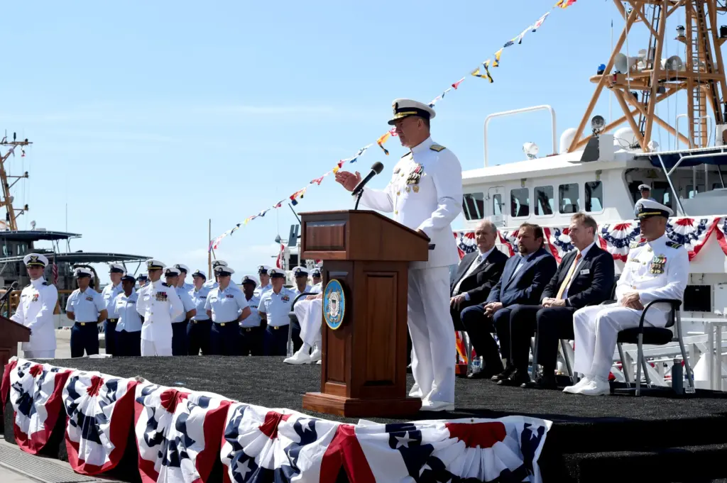 Admiral Karl L Schultz speaks to the crowd gathered for...