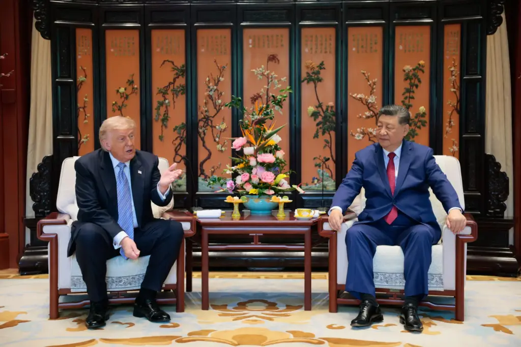 Chinese President Xi Jinping and President Donald Trump attend a meeting.