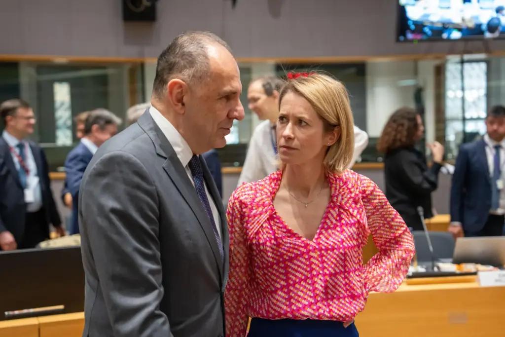 Greece's Foreign Minister Giorgos Gerapetritis speaks with European Union foreign policy chief Kaja Kallas.