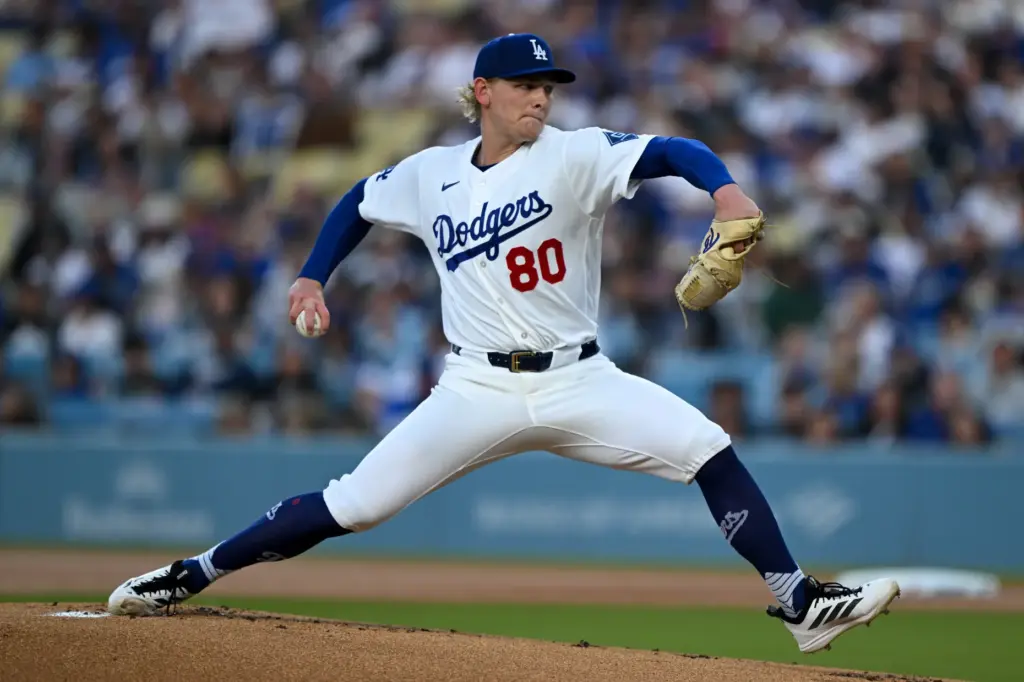 Dodgers starting pitcher Emmet Sheehan throws to the plate during...