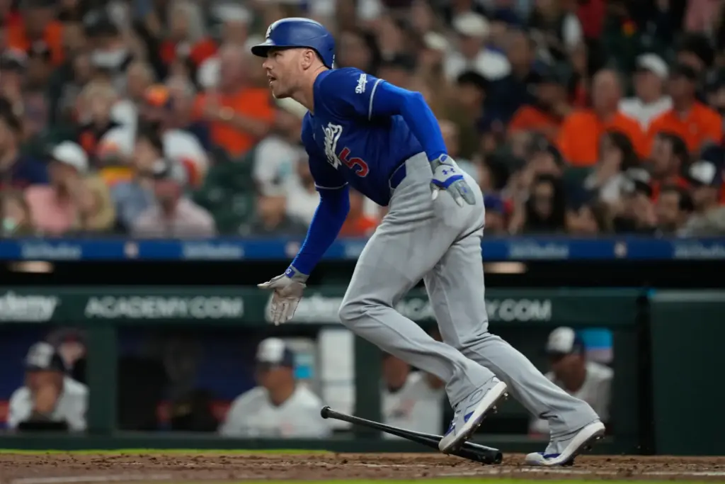 The Dodgers’ Freddie Freeman runs after hitting a double during...