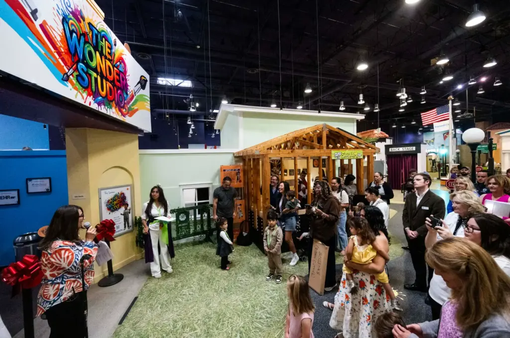 People gather for the opening of The Wonder Studio at...