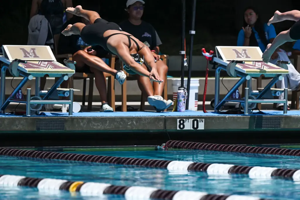 Alyssa Ton of Fountain Valley high school dives in for...