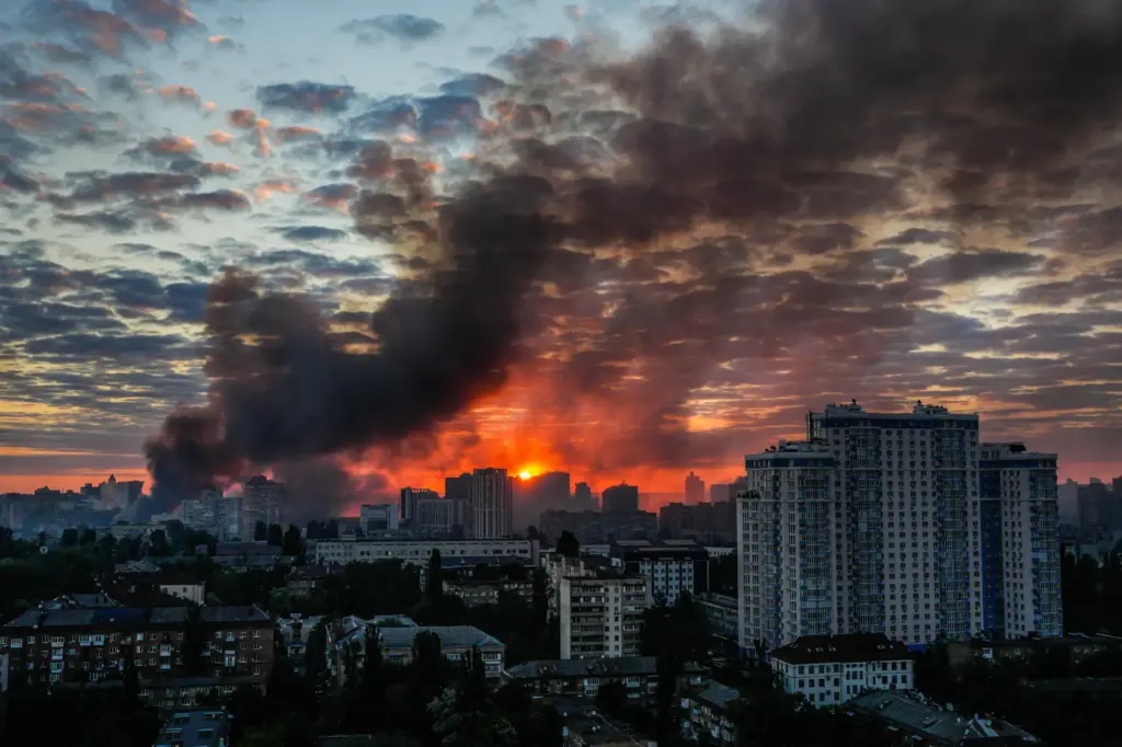 Smoke rises in the aftermath of a Russian attack in Kyiv, Ukraine.