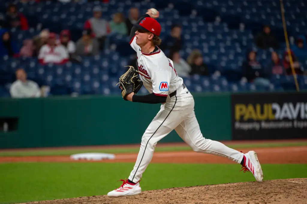 Cleveland Guardians relief pitcher Peyton Pallette throws to the plate...