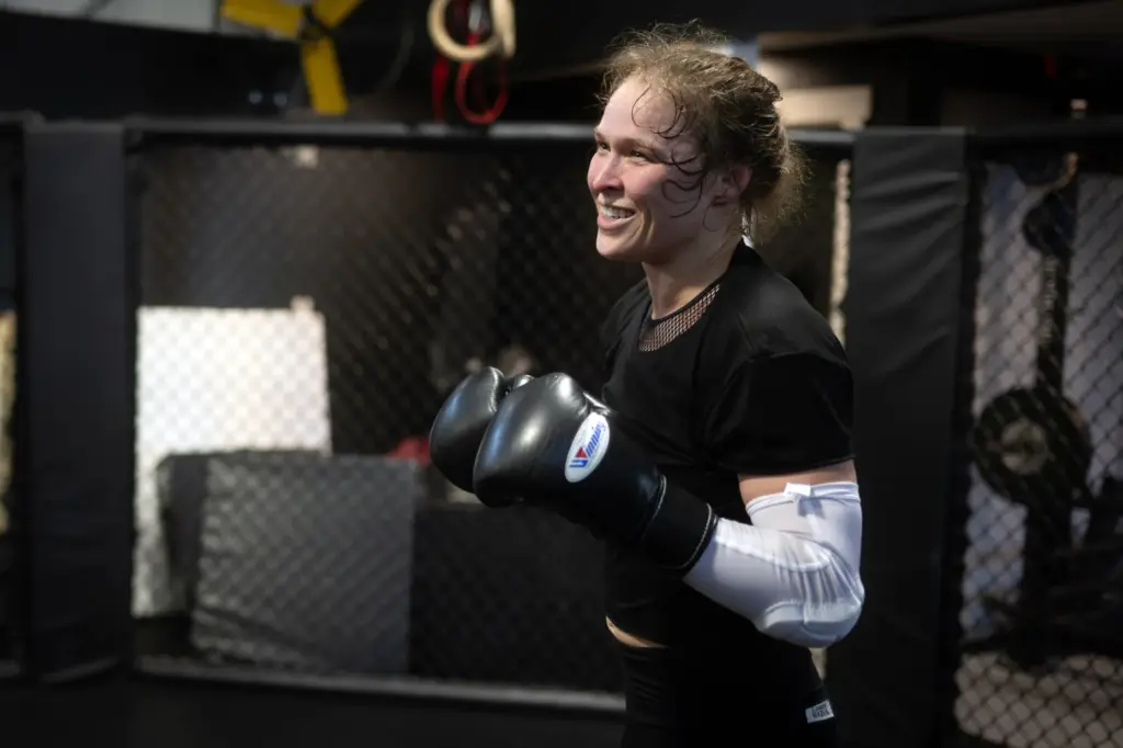 Former UFC champion and Olympic medalist Ronda Rousey prepares for...