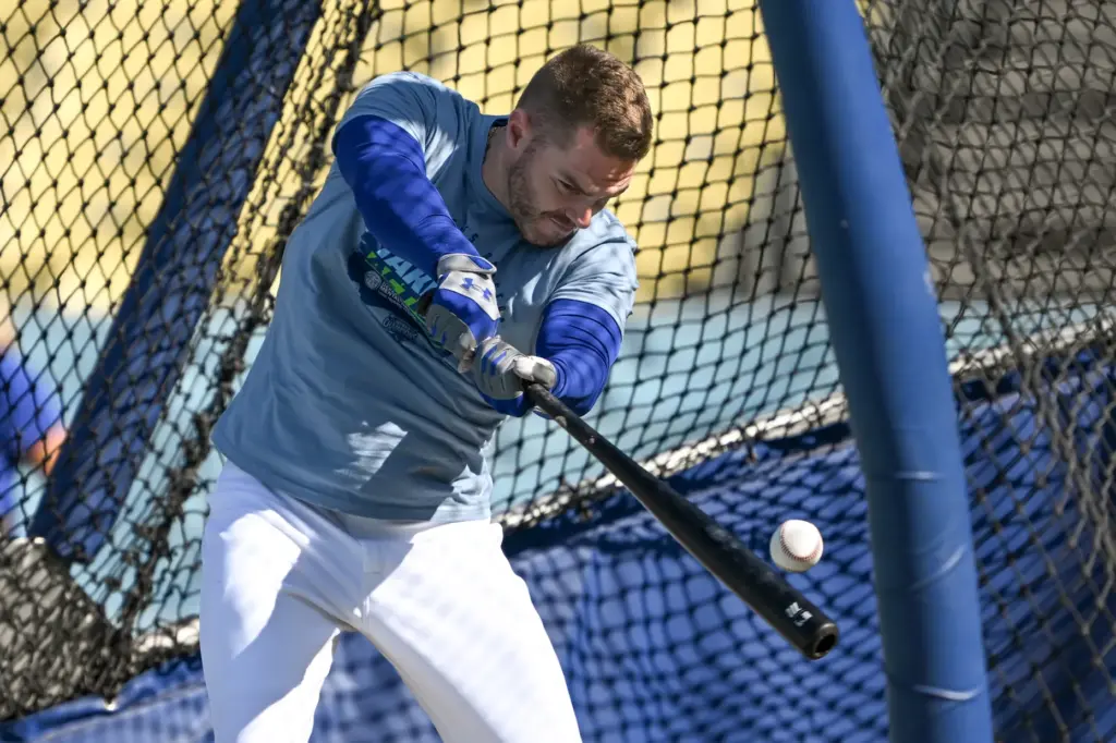 Dodgers first baseman Freddie Freeman takes batting practice before a...