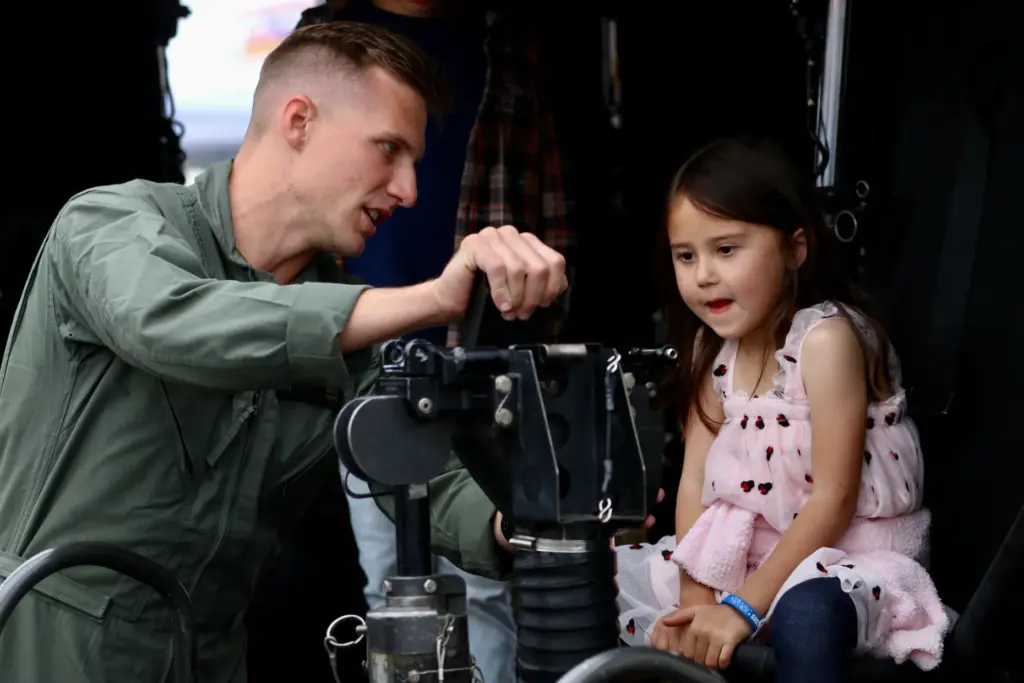 Capt. Harrison Mace engages with an aspiring Navy helicopter pilot...