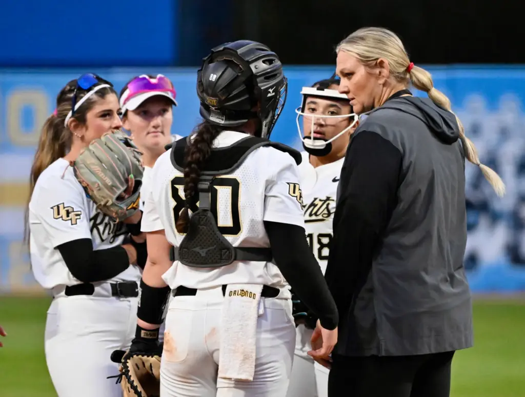 Head coach Cindy Ball-Malone of the UCF Knights talks with...