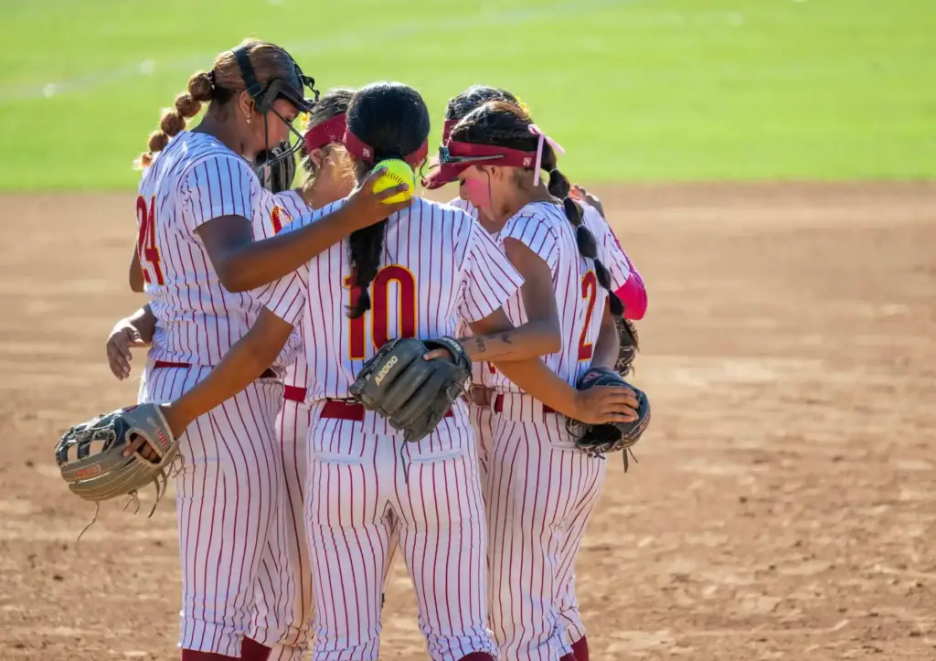Oxnard infielders huddle together at the mound during the CIF-SS...