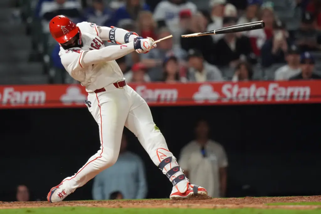 The Angels’ Jo Adell breaks his bat while grounding out...