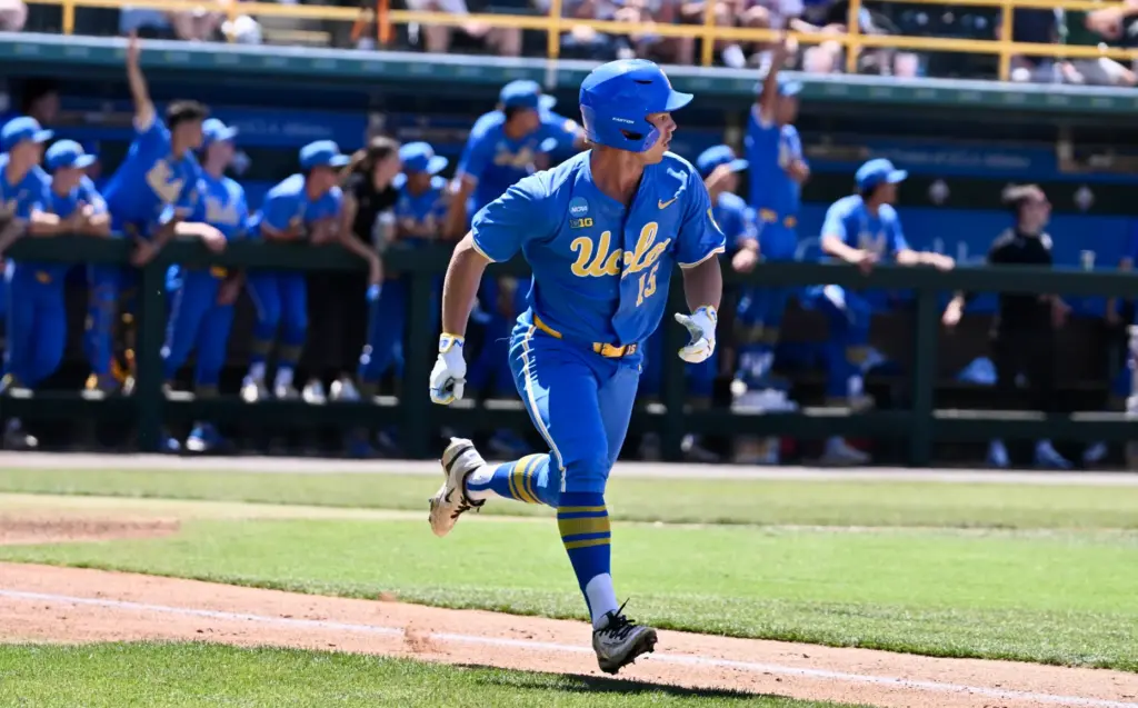 Jarrod Hocking #15 of the UCLA Bruins watches his RBI...