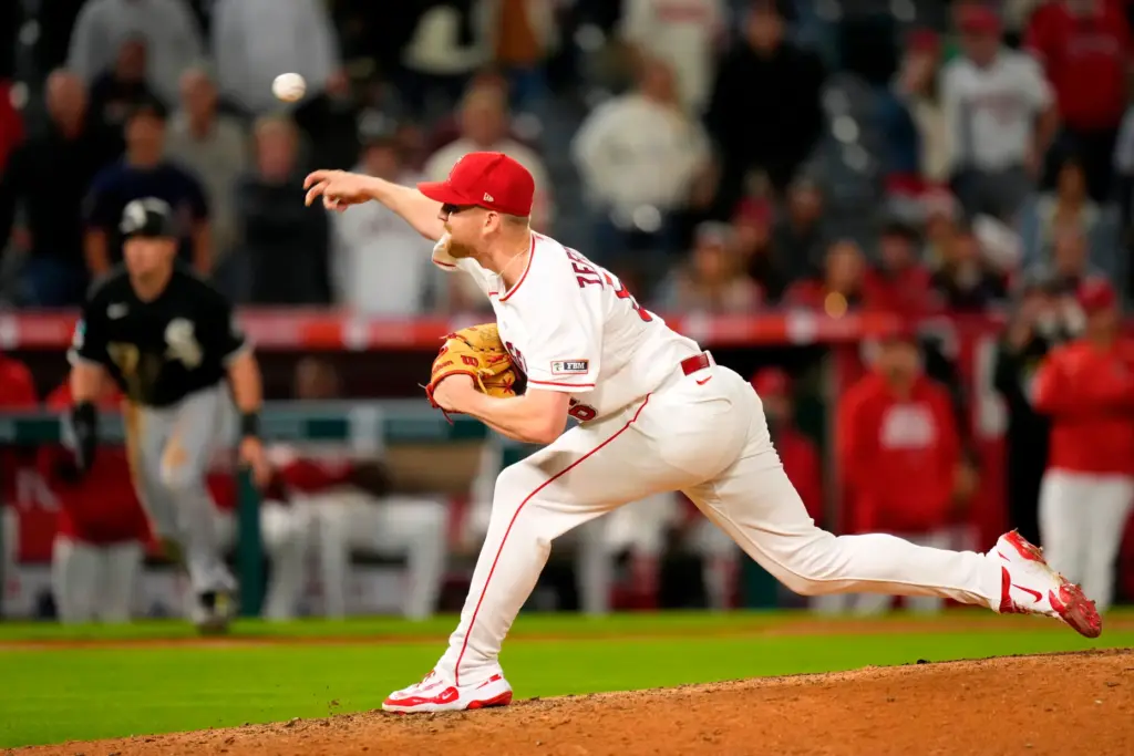 Angels relief pitcher Ryan Zeferjahn throws to the plate during...