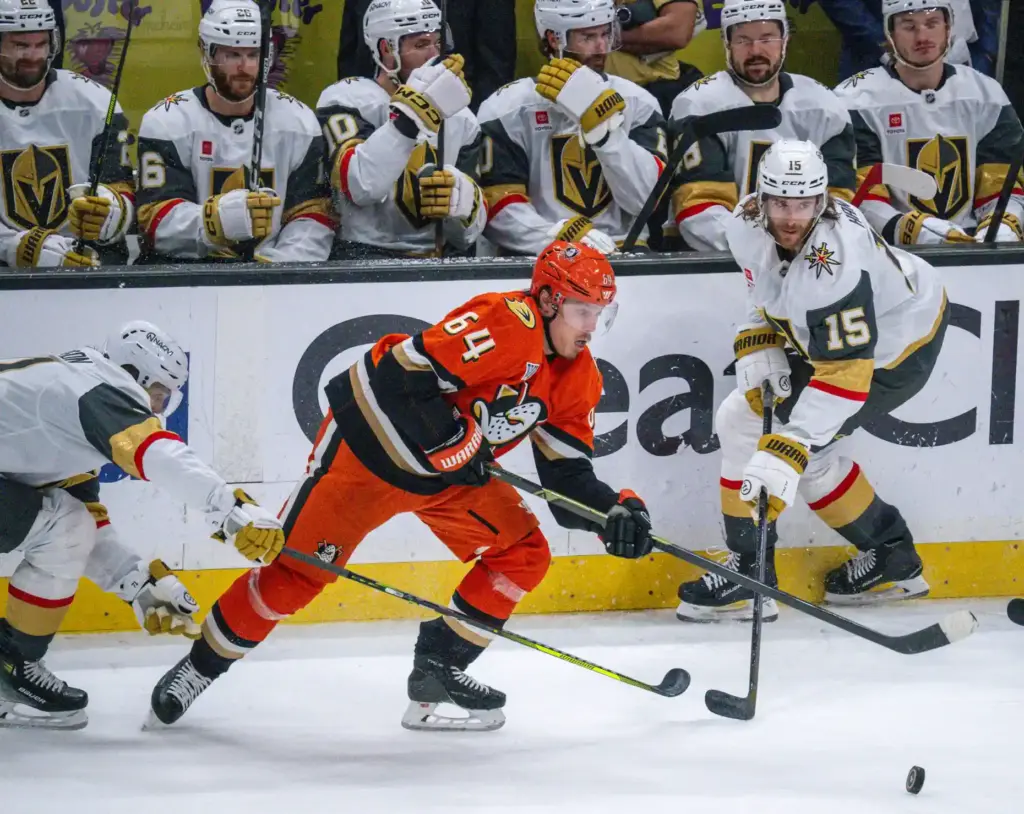 The Ducksâ Mikael Granlund (64) controls the puck in traffic...