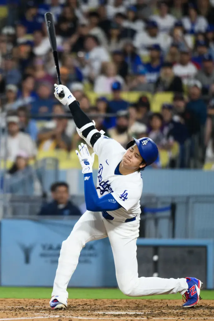 Dodgers star Shohei Ohtani strikes out swinging during the fifth...