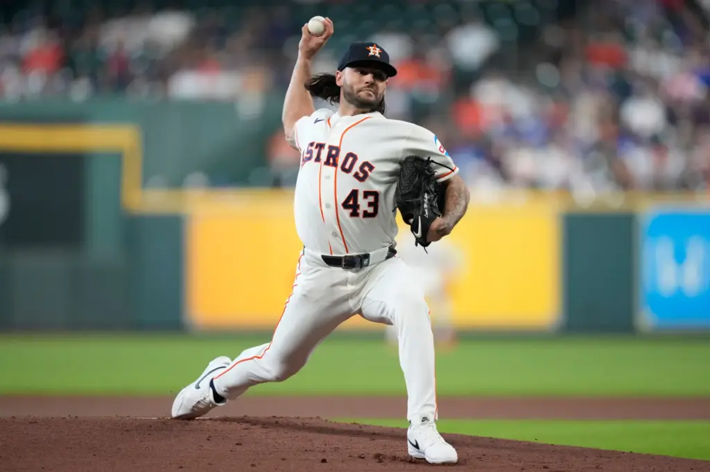 Houston Astros starting pitcher Lance McCullers Jr. throws to the...
