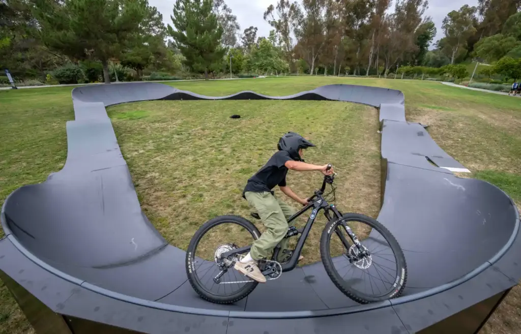 Adrian Khosravi, 13, of Mission Viejo leans into a curve...
