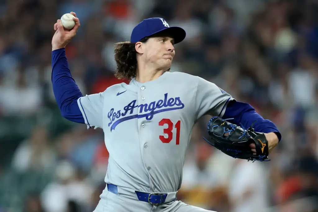 Dodgers starting pitcher Tyler Glasnow throws to the plate during...