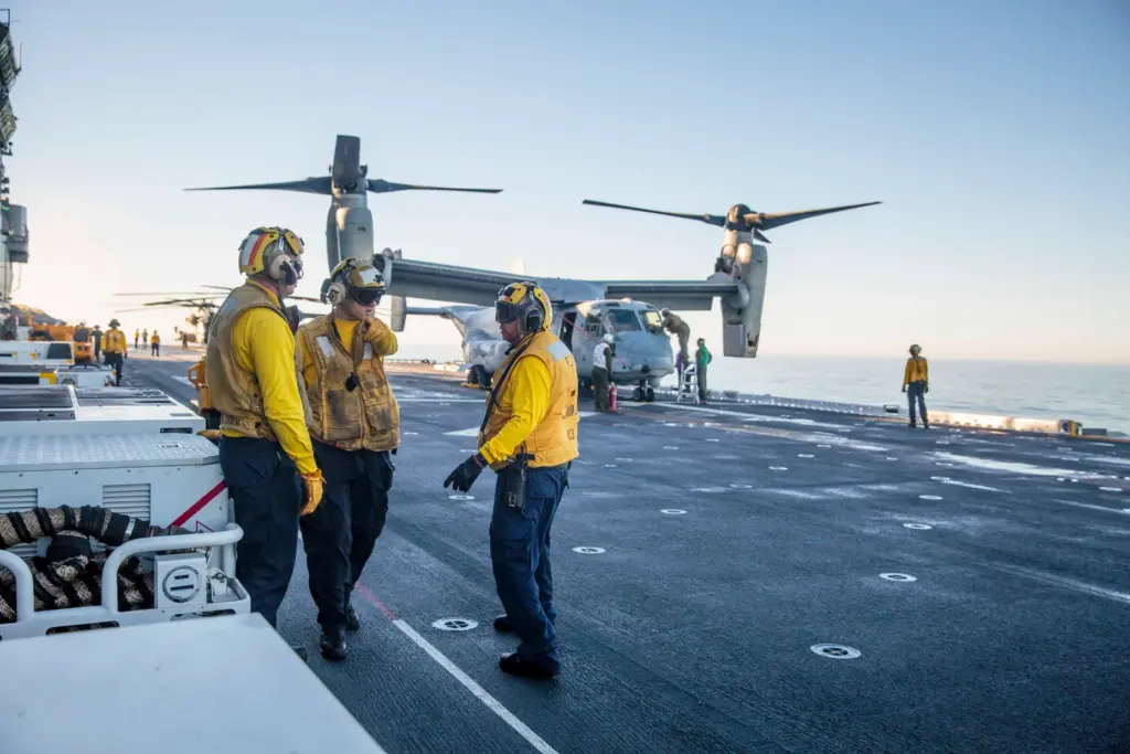 U.S. Navy aviation boatswain mate handlers, assigned to the USS...