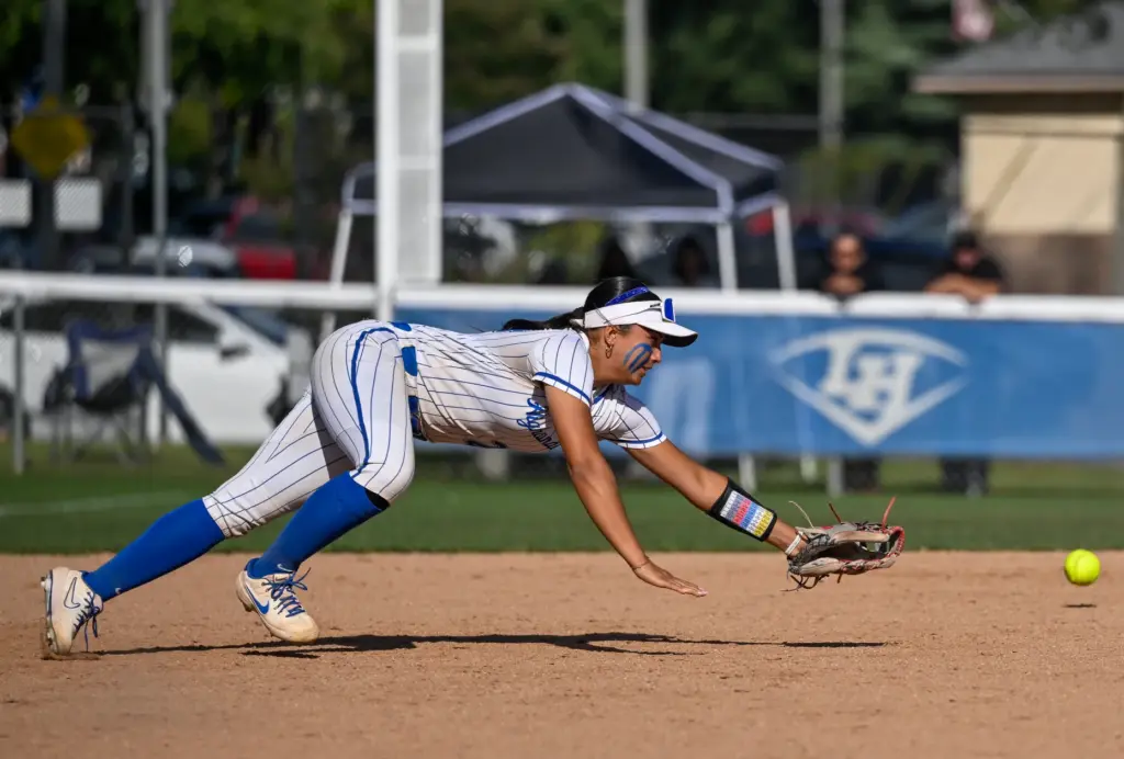 La Habra third baseman Mireya Gonzalez dives for a ground...