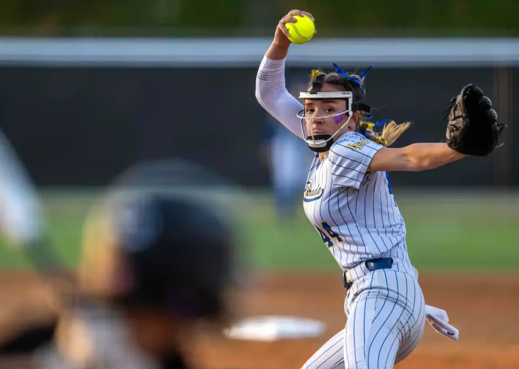La Mirada pitcher Alison Ortega throws to home plate during...