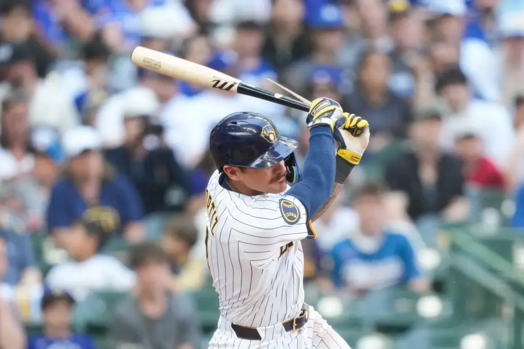 Milwaukee Brewers’ Joey Ortiz breaks breaks his bat on an...