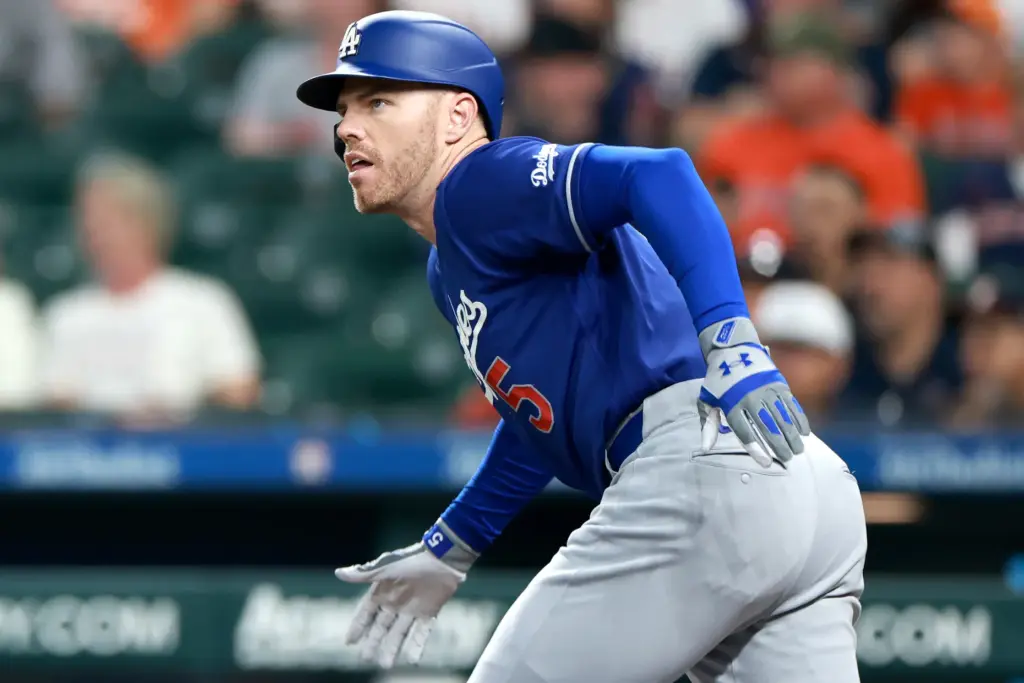 The Dodgers’ Freddie Freeman hits a double during the first...