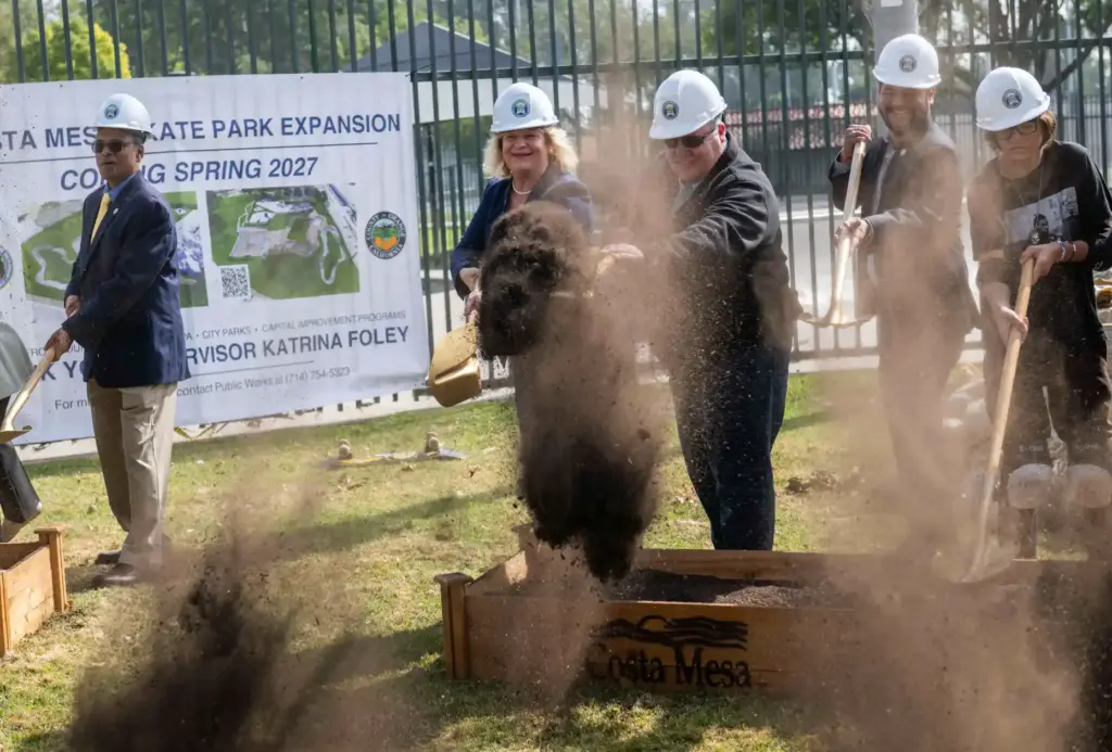 Orange County Supervisor Katrina Foley, center, is joined by Costa...