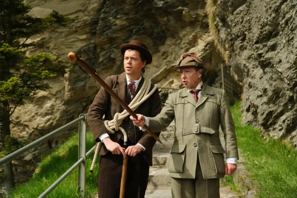 Martin Iggland as Melchior Anderegg and Philip Porter, as, Sherlock Holmes.