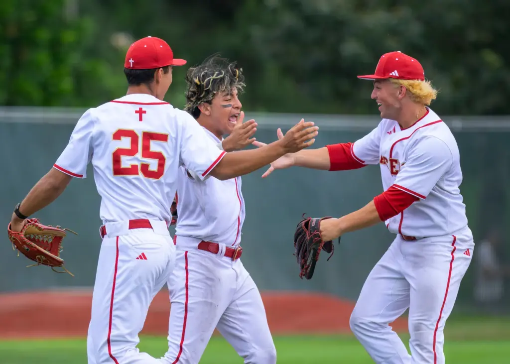 Orange Lutheran’s Eric Zdunek, Ricardo Hurtado, and Hamilton Friedberg, from...