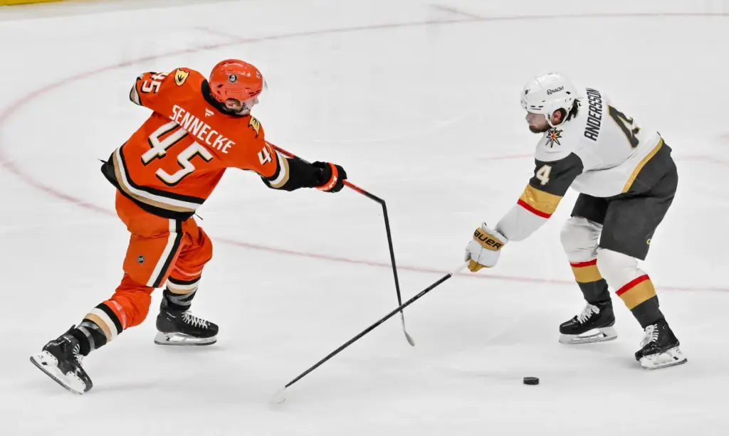 The Ducksâ Beckett Sennecke, left, breaks his stick as he...
