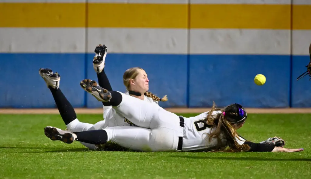 Right fielder Taylor Kittleman, left, and second baseman Sierra Humphreys...