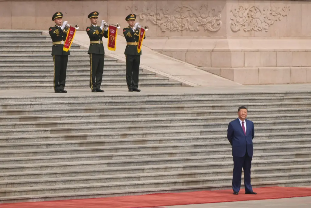 China's President Xi Jinping arrives to welcome President Donald Trump.