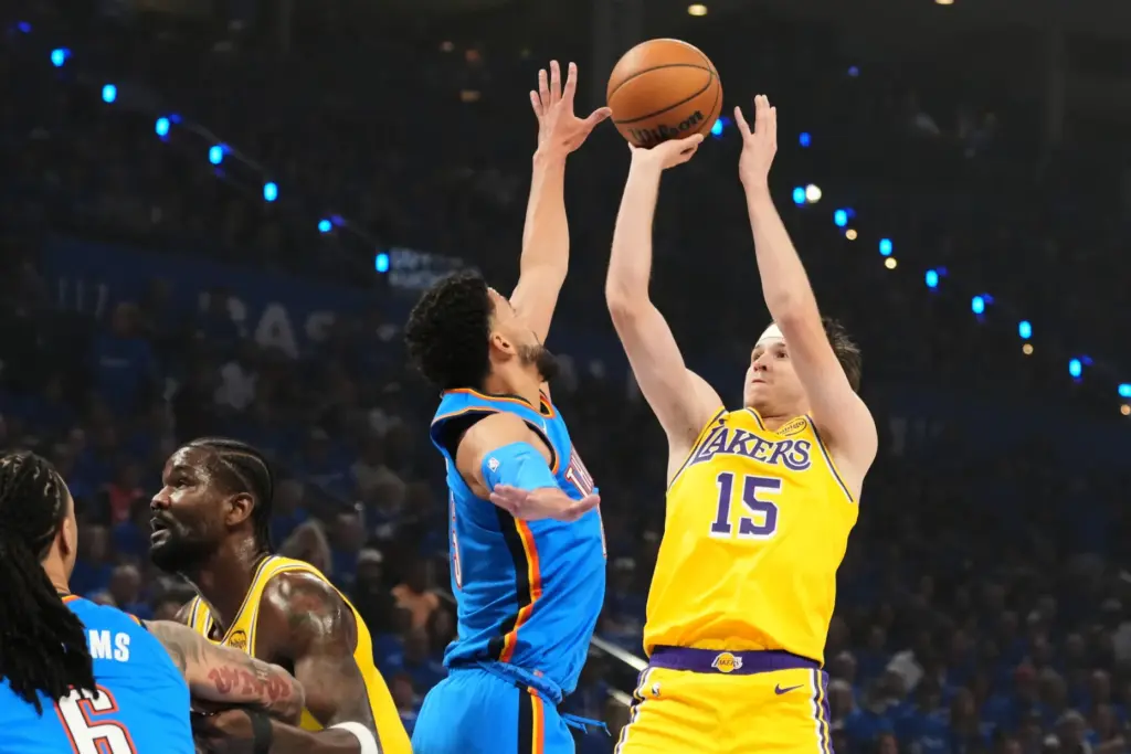 Lakers guard Austin Reaves shoots as Oklahoma City Thunder guard...