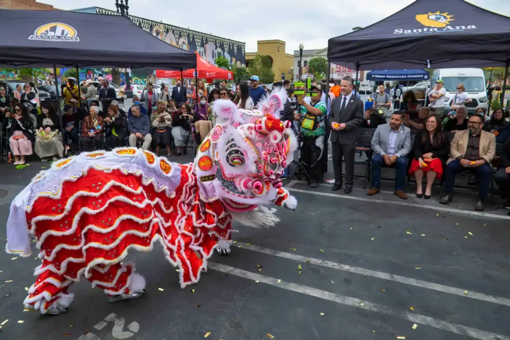 Lion dancers perform at the Chinatown Memorial unveiling ceremony in...