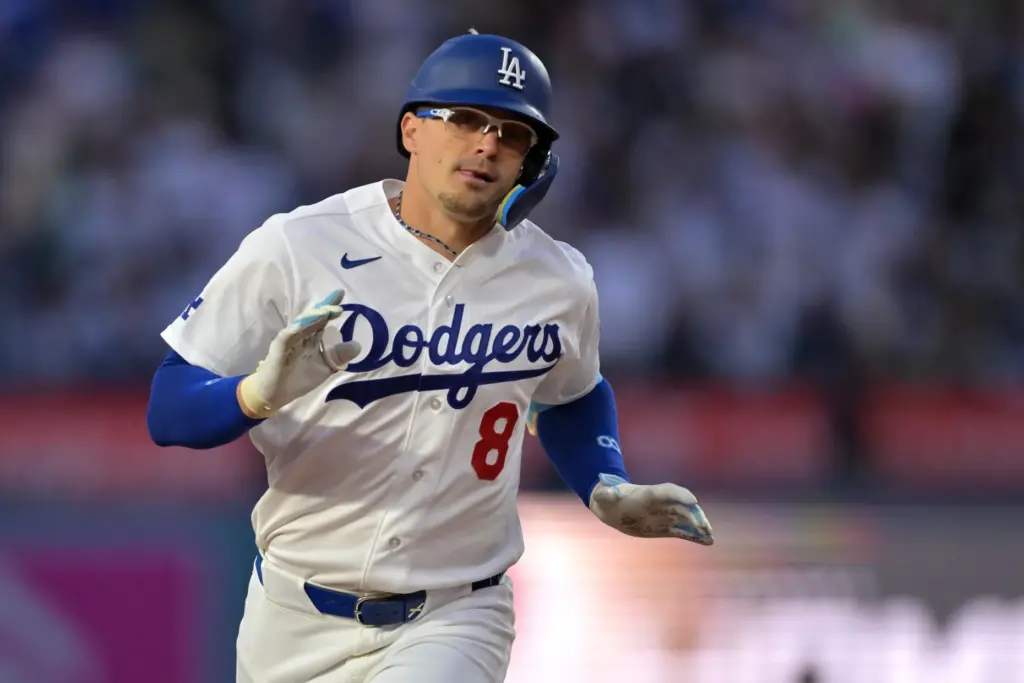 The Dodgers’ KikÃ© Hernandez runs the bases after hitting a...