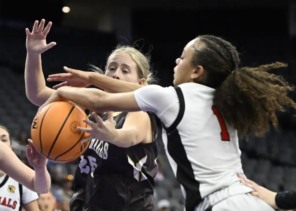 Meghan Rehmeier #25 of Laguna Hills reaches for the rebound...