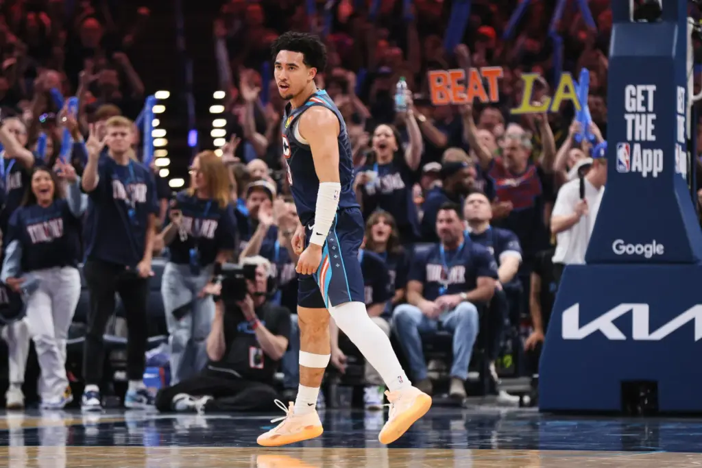 Oklahoma City Thunder guard Jared McCain celebrates after sinking a...
